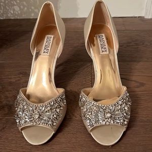 Beautiful satin cream color shoes embellished with authentic crystals in front